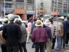 A crowd gathers after the taxi incident, Tibetan Quarter, Lhasa, Tibet