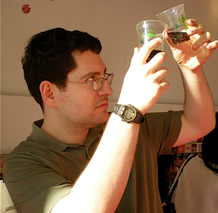 Jonathan carefully compares Coke Classic and Coke Zero at the World of Coca-Cola museum in Atlanta, GA.