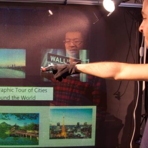 Thumbnail of A Two-Sided Collaborative Transparent Display Supporting Workspace Awareness
